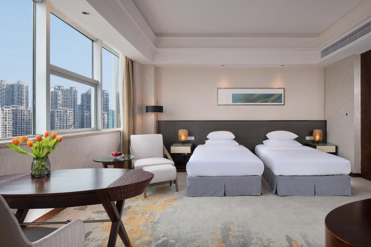 Golden Shining New Century Grand Hotel Бэйхай Экстерьер фото