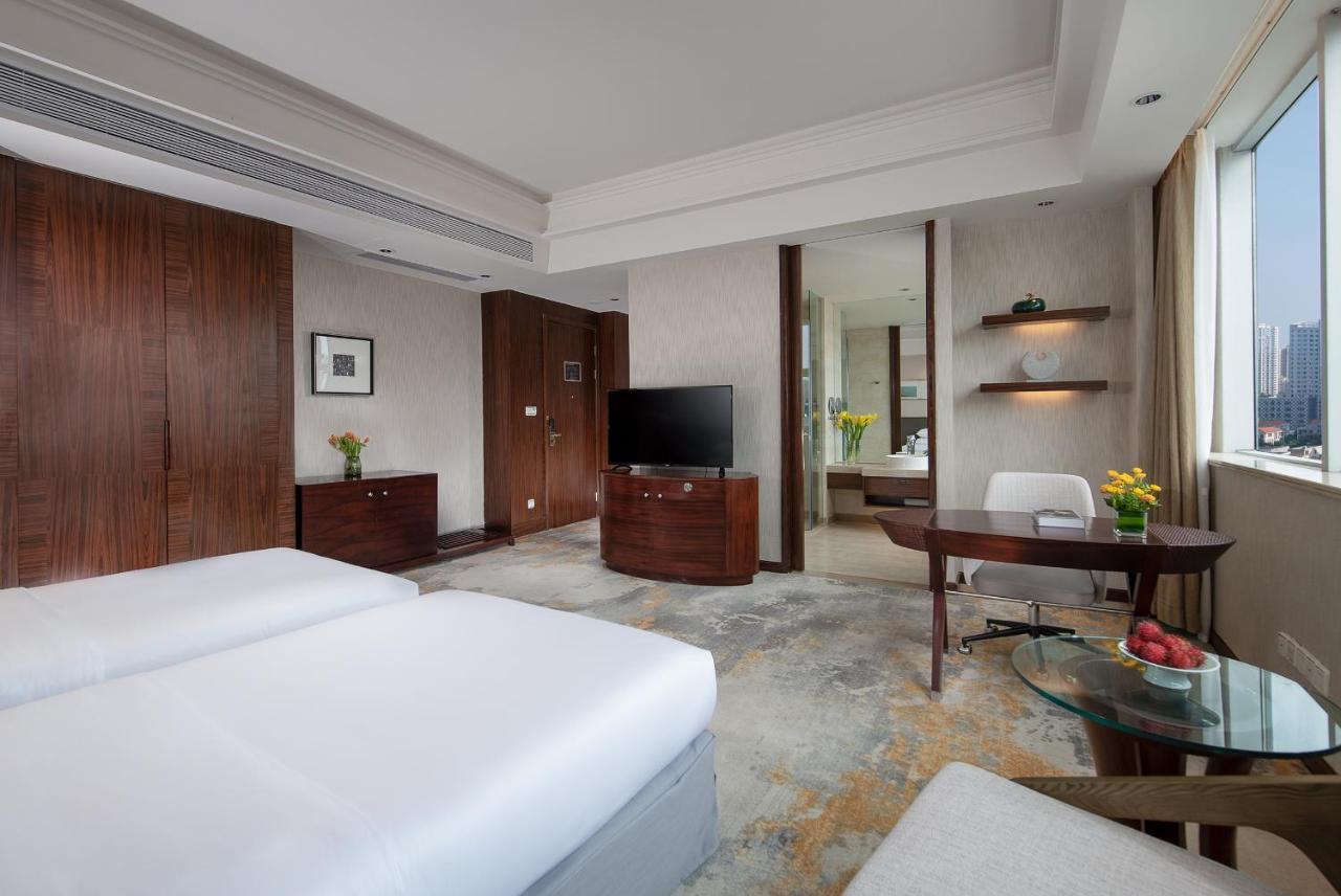 Golden Shining New Century Grand Hotel Бэйхай Экстерьер фото