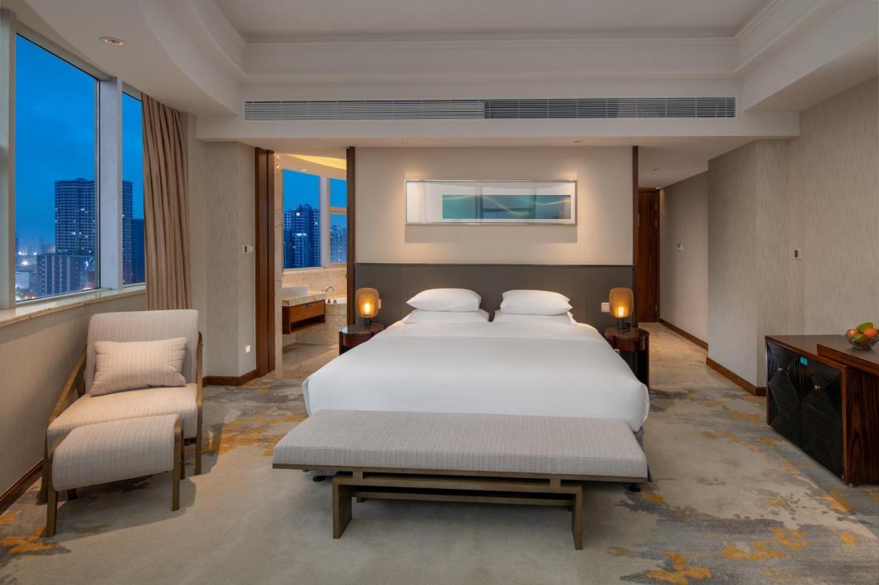 Golden Shining New Century Grand Hotel Бэйхай Экстерьер фото